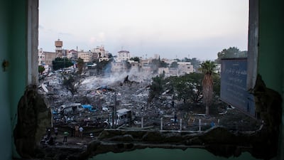 Hours after a ceasefire was declared between Hamas and Israel, the people of Gaza City begin to rebuild. Shops open and families go out to witness the damage incurred by the recent strikes.