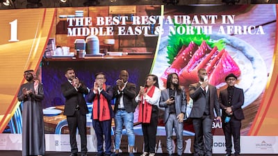 The team from 3 Fils, the Dubai restaurant that topped the list, accept their award.