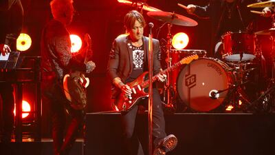 Keith Urban performs during the 55th Annual Country Music Association Awards at Bridgestone Arena on November 10, 2021 in Nashville, Tennessee. AFP