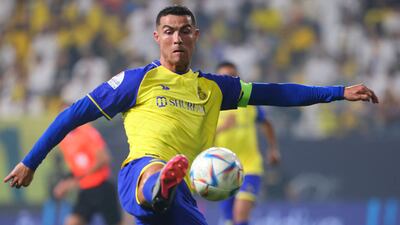 Cristiano Ronaldo controls the ball during the Saudi Pro League match between Al Nassr and Al Khaleej.
