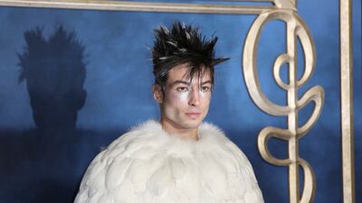 Actor Ezra Miller poses for photographers upon arrival at the premiere of the film 'Fantastic Beasts: The Crimes of Grindelwald', at a central London cinema in 2018. AP
