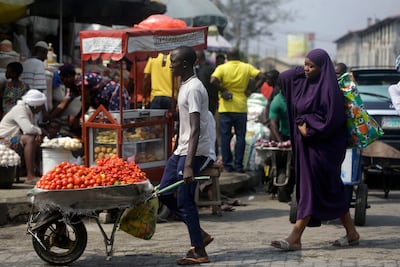 A survey of people aged 18 to 24 in 15 countries found that many Africans are battling the economic downturn caused by Covid-19. Some turn to selling farm produce or other goods on the street. Photo: AP