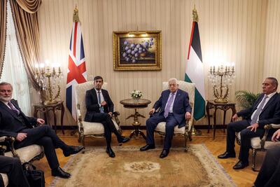 Palestinian president Mahmoud Abbas (C-R) and the secretary general of the Executive Committee of the Palestine Liberation Organisation (PLO) Hussein Al Sheikh (R) meet Britain's Prime Minister Rishi Sunak in Cairo, on October 20. AFP