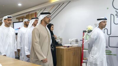 Sheikh Mansour and Ahmad Al Falasi, Minister of State for Entrepreneurship and SMEs, during the tour of the university.