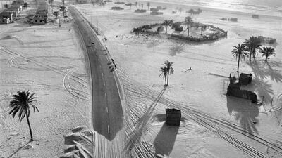The road from Abu Dhabi to Dubai, 10 kms from Dubai in 1975. The location would be close to Jumeirah Beach Park today.