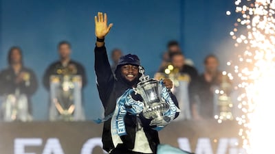 Manchester City's Antoine Semenyo with the FA Cup troph. PA