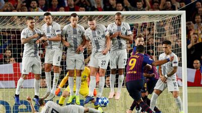Inter Milan's Mauro Icardi, Matias Vecino, Ivan Perisic, Milan Skriniar and Miranda jump as Marcelo Brozovic lies on the pitch to block a free kick by Barcelona's Luis Suarez. Reuters