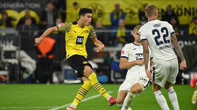 Dortmund's US midfielder Giovanni Reyna (L) scores the opening goal. AFP