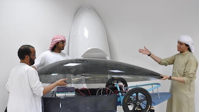 Engineering students from one of the UAE teams working on their car for the 2014 Taqa GCC Hybrid-Electric Challenge. Courtesy Arman Molki