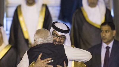 Sheikh Mohammed bin Zayed, Crown Prince of Abu Dhabi and Deputy Supreme Commander of the Armed Forces, greets Narendra Modi, Prime Minister of India, upon arriving at Air Force Station. Ryan Carter / Crown Prince Court - Abu Dhabi