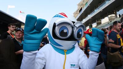 The Yas Marina circuit mascot walks among fans in the pit lane. Marwan Naamani/AFP