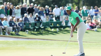 Maya Gaudin putts during the Drive, Chip and Putt Championship at Augusta National Golf Club. Getty