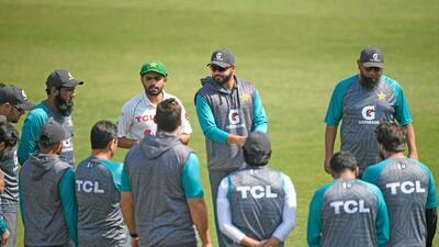 Pakistan's captain Babar Azam, third left, speaks with teammates prior to a practice session at the Rawalpindi Cricket Stadium. AFP