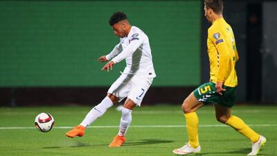 Alex Oxlade-Chamberlain of England scores their third goal against Lithuania on Monday night in their Euro 2016 qualifying match. Alex Livesey / Getty Images