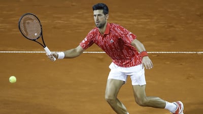 Novak Djokovic of Serbia returns the ball to Filip Krajinovic of Serbia during the Adria Tour charity exhibition hosted by Djokovic in Belgrade on Saturday. Getty