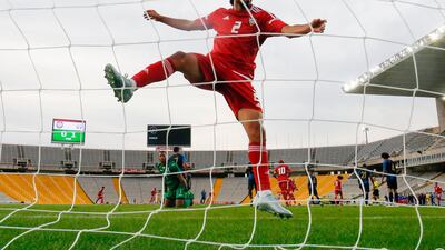 UAE´s defender Mohamed Al-Minhali jumps after UAE's midfielder Omar Abdulrahman scored during a friendly football match between United Arab Emirates and Honduras at the Estadi Olimpic Lluis Companys in Barcelona. AFP