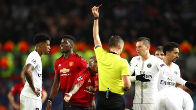 Manchester United's Paul Pogba is shown a red card. Getty Images