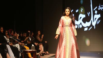 A model displays a creation by Omani designer Nourah Karim during the launch of the 6th edition of the Ladies A La Mode fashion show, in the Omani capital Muscat. AFP