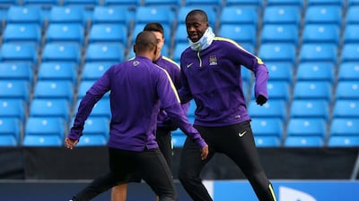 Yaya Toure of Manchester City closes down Fernandinho of during a team training session on Tuesday ahead of their Wednesday Champions League match against CSKA Moscow. Alex Livesey / Getty Images / November 4, 2014
