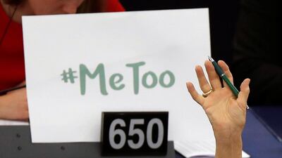 A placard with the hashtag 'MeToo' is seen on a European Parliament member's desk during a debate on preventive measures against sexual harassment and abuse on October 25, 2017. Christian Hartmann / Reuters