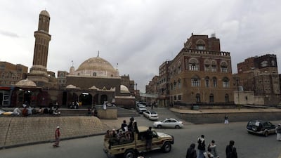Yemenis walk through a road in the old city of Sanaa, Yemen on March 26, 2015. Yahya Arhab/EPA