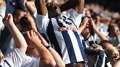 A West Brom fan reacts to a missed chance from his team during the Black Country derby against Wolves. West Brom would win 2-0. Laurence Griffiths / Getty Images