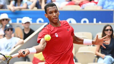 Felix Auger-Aliassime of Canada in action against Carlos Alcaraz of Spain. EPA