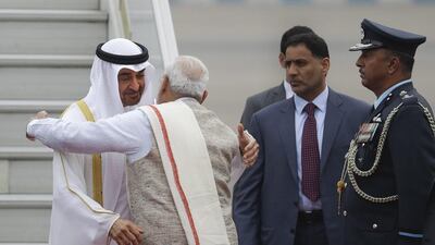 Sheikh Mohammed bin Zayed, Crown Prince of Abu Dhabi and Deputy Supreme Commander of the Armed Forces, embraces the Indian prime minister Narendra Modi upon his arrival at the airport in New Delhi. Sheikh Mohammed will be India's chief guest at Thursday's Republic Day celebrations. Manish Swarup / AP Photo