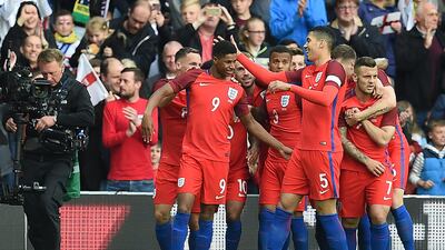 10) Marcus Rashford (18 years 208 days) v Australia in May 2016. AFP