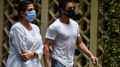 Bollywood actor Shah Rukh Khan arrives to pay his respects at the residence of Indian actor Dilip Kumar, after he died at the age of 98 in Mumbai on July 7, 2021.