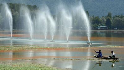Kashmiri fisherman on Dal Lake in Sringar. Tauseef Mustafa / AFP