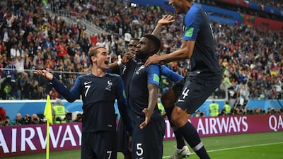 SAINT PETERSBURG, RUSSIA - JULY 10: Samuel Umtiti of France celebrates with team mates after scoring his team's first goal during the 2018 FIFA World Cup Russia Semi Final match between Belgium and France at Saint Petersburg Stadium on July 10, 2018 in Saint Petersburg, Russia. (Photo by Shaun Botterill/Getty Images)