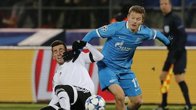 Jose Gaya, left, and Valencia fell flat against Oleg Shatov and Zenit in Uefa Champions League group play on Tuesday and have not been much better in Primera Liga, with fans chanting for Portuguese manager Nuno Espirito Santo to be fired at home games. Anatoly Maltsev / EPA