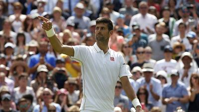 Novak Djokovic salutes the crowd after his straight sets win over Jamed Ward. Paul Childs / Reuters
