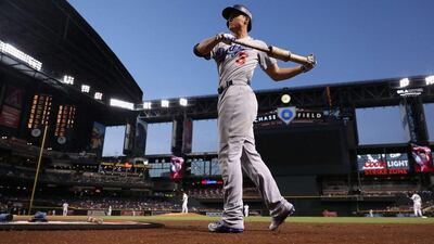 Corey Seager of the Los Angeles Dodgers warms up on deck during the first inning against the Arizona Diamondbacks last week. Christian Petersen / Getty Images / AFP / September 16, 2016