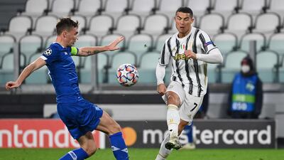 Juventus forward Cristiano Ronaldo under pressure from Serhiy Sydorchuk of Kiev. AFP