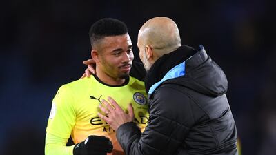 Pep Guardiola, manager of Manchester City, embraces goalscorer Gabriel Jesus. Getty