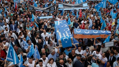 Uighurs living in Turkey protesting their treatment by China / AP