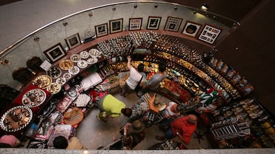 Tourists at the souvenir shop in Dubai Museum in 2008. Jeffrey E Biteng / The National