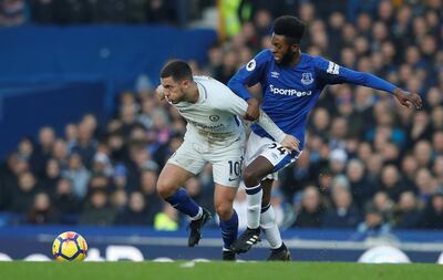 Chelsea forward Eden Hazard, left, and Everton midfielder Beni Baningime. Phil Noble / Reuters