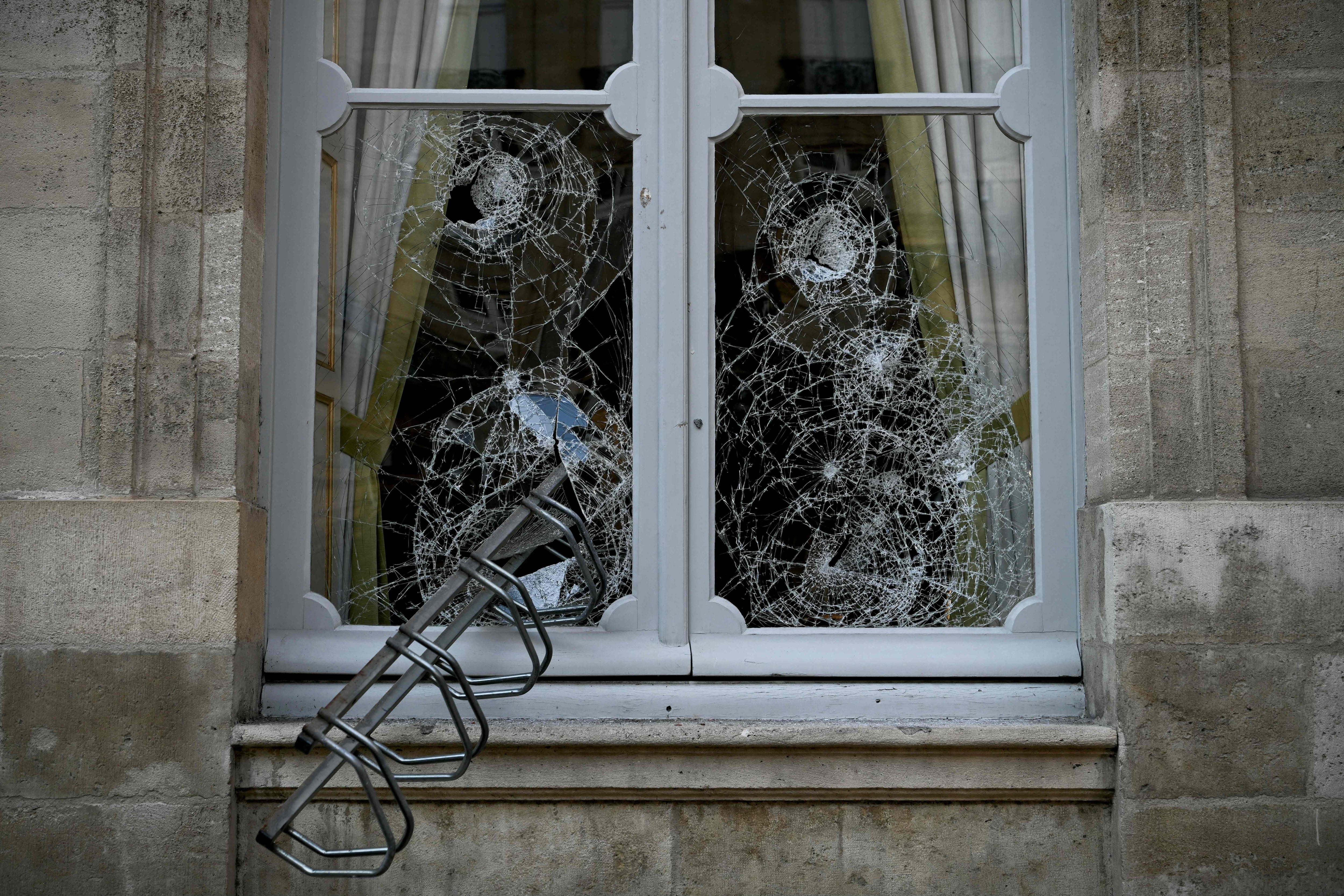 A bicycle rack smashed against a window at the Hotel de Nesmond, the state's official residence in Gironde, in Bordeaux. AFP