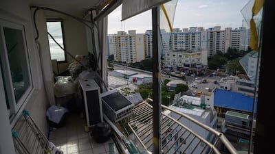 Windows and air conditioning units damaged by Typhoon Maysak at an apartment near Gwangalli beach in Busan. AFP