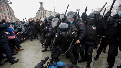 Law enforcement officers clash with participants during a rally in support of jailed Russian opposition leader Alexei Navalny in Moscow. Reuters