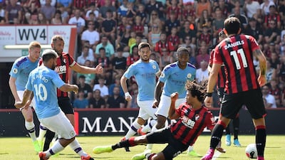 Manchester City's Sergio Aguero lashes home the opening goal in a 3-1 win away at Bournemouth. AFP