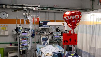 A heart-shaped balloon by a patient's bed, at the neonatal intensive care unit after the department was moved to an underground parking of the Sheba medical center in the Israeli city of Ramat Gan near Tel Aviv, on May 18. AFP