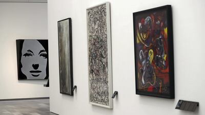 Work by some of the world's great modern artists, including Jackson Pollock, are on display at Louvre Abu Dhabi. Chris Whiteoak / The National