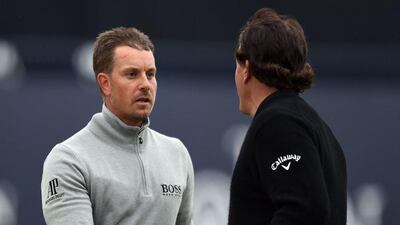 British Open leader Henrik Stenson, left, and Phil Mickelson, right, tee off at 5.35pm UAE time. Glyn Kirk / AFP