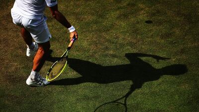 A detail shot of the shadow of Richard Gasquet of France as plays against James Duckworth of Australia on Day 2 of the 2014 Wimbledon Championships on Tuesday. Gasquet won in five sets. Dan Kitwood / Getty Images / June 24, 2014