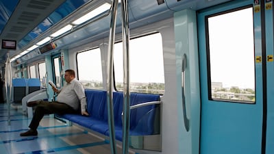 A passenger on a quiet train in 2010. Jeffrey E Biteng / The National