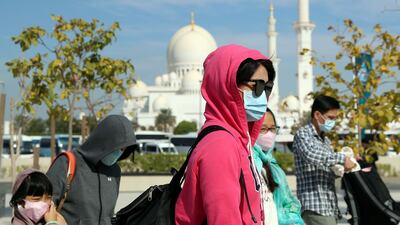 Mask wearing was mandatory in the UAE for more than two years. Chris Whiteoak / The National